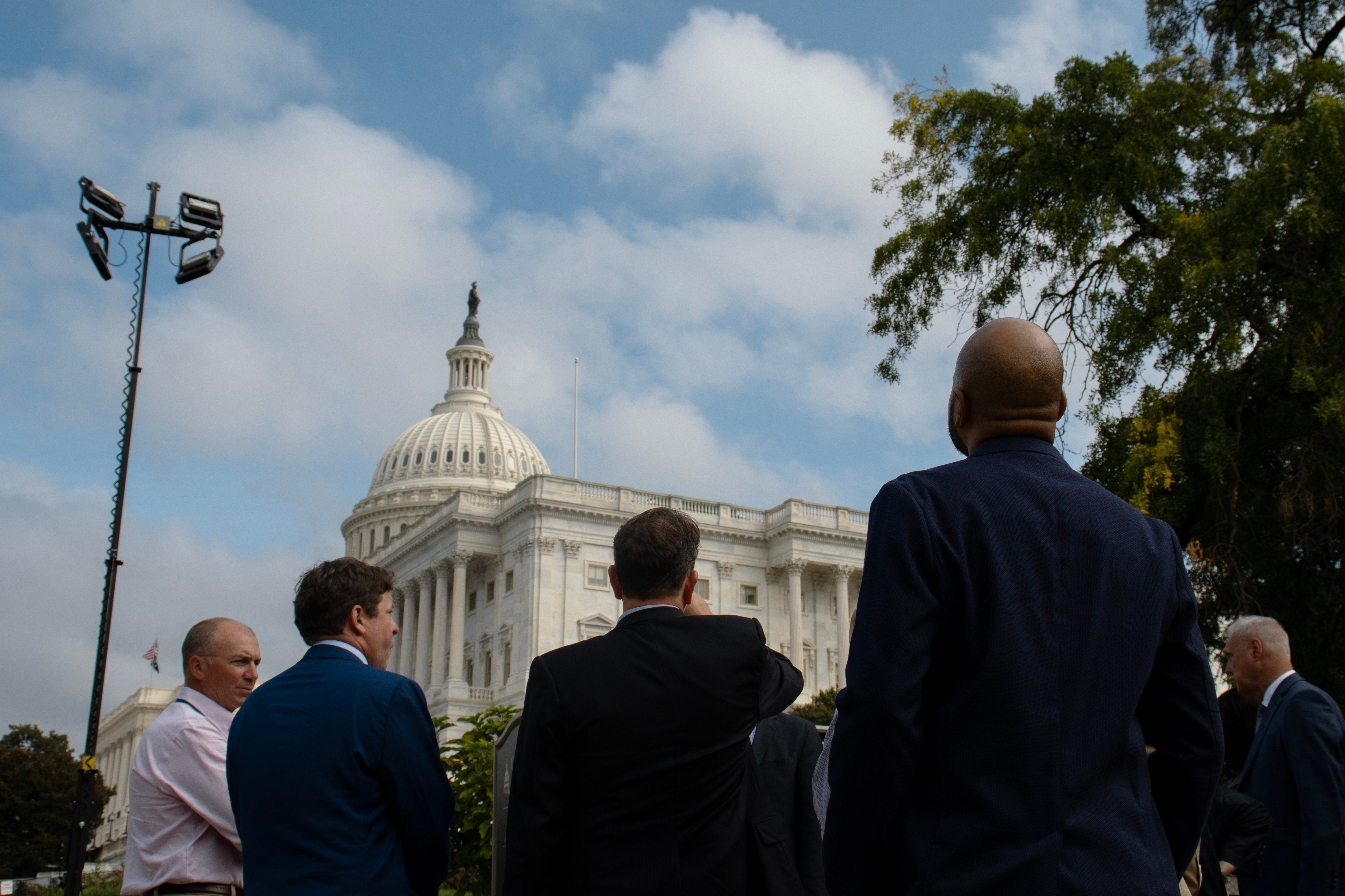 people outside the capitol building in washington d.c.