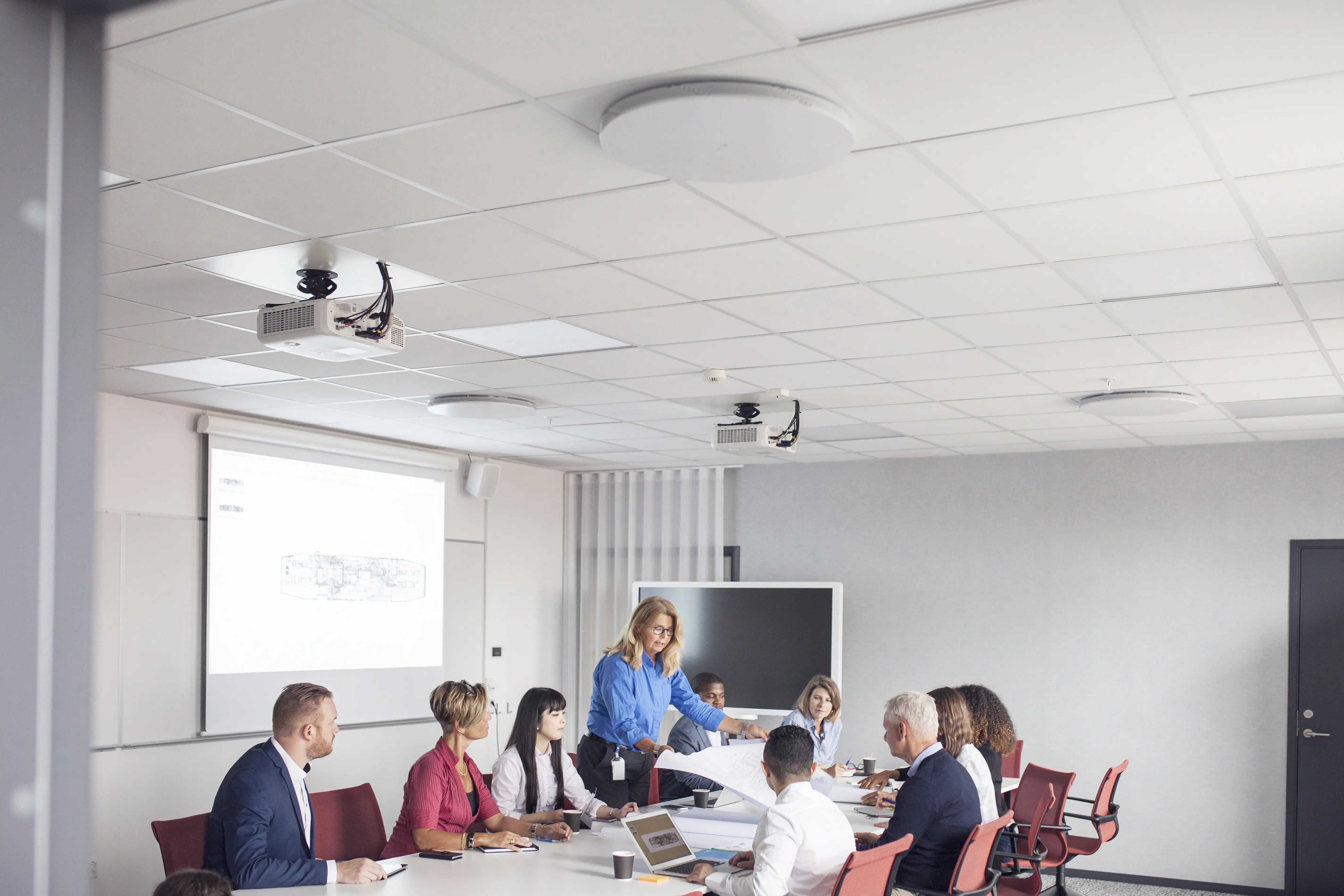 Ceiling-mounted speakers used in sound masking systems to emit pink noise for better workplace acoustics